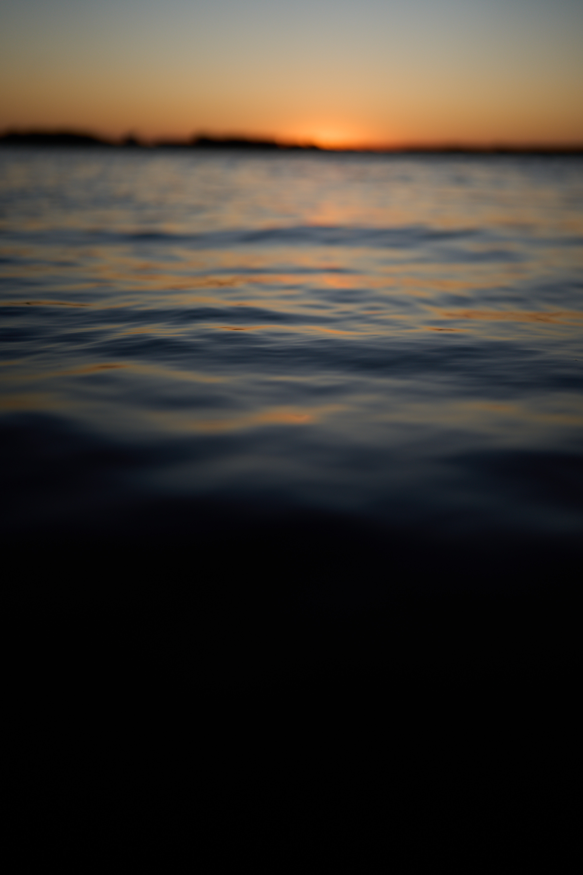 sunset colors reflected in the water